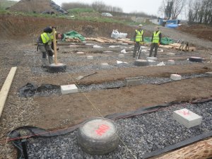 The foundations of the roundwood timberframe home.