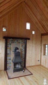 Internal view of Summer house with wood burner.