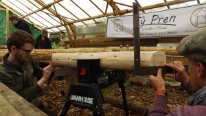 Working on the roundwood timber frame.